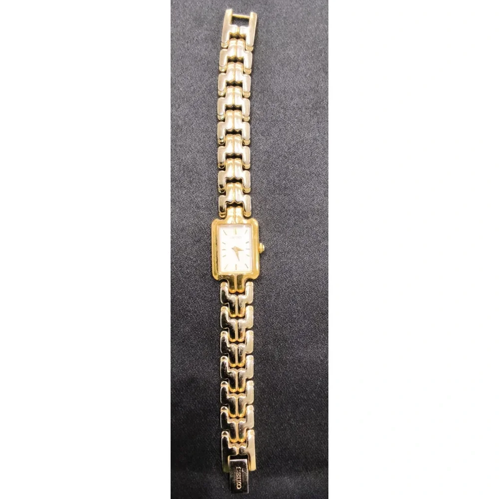 Vintage Seiko 1N00-6T10 Women's Watch Rectangle Gold Tone White Face #W5165